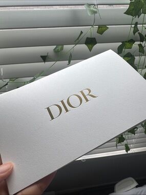 Dior White Card with Gold Logo